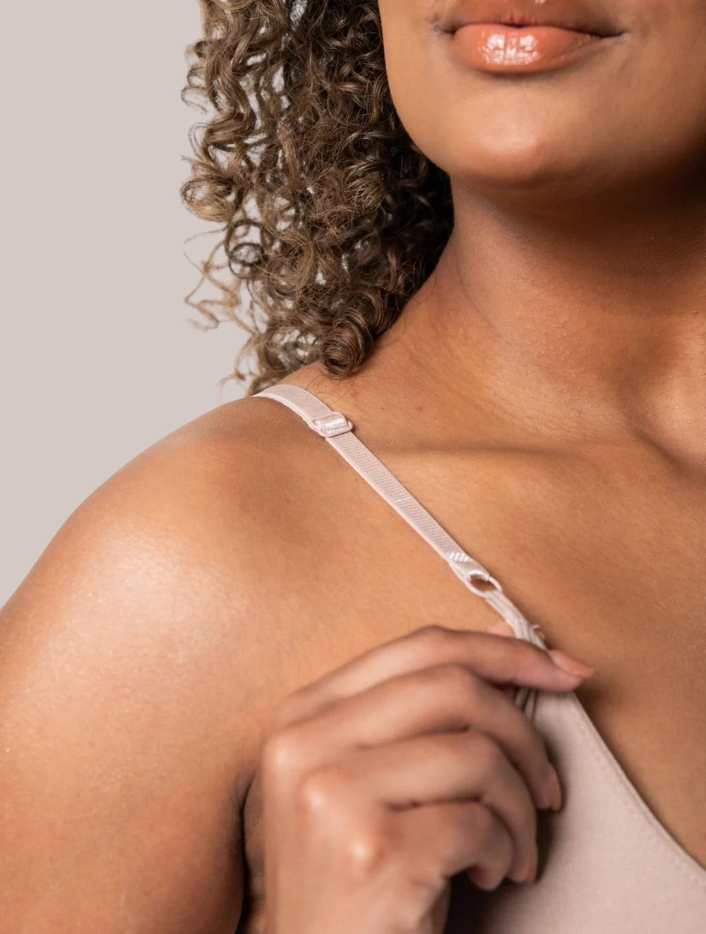 Inshapewear™ beige seamless shaping bodysuit with adjustable straps for a smooth, comfortable fit.