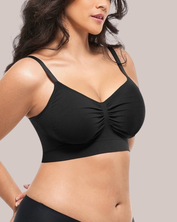 Inshapewear™ black seamless bra with a ruched center detail, offering a comfortable and lifting fit on a model.