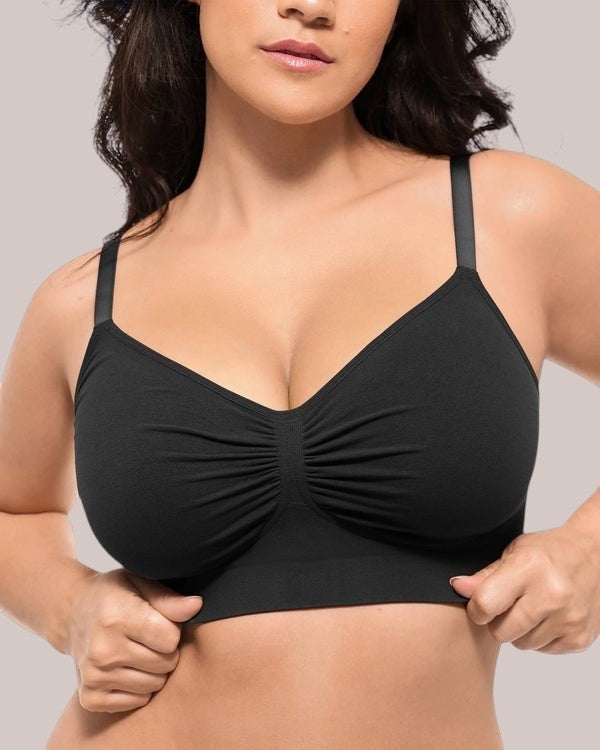 Inshapewear™ black seamless bra with a ruched center detail, offering a comfortable and lifting fit on a model.