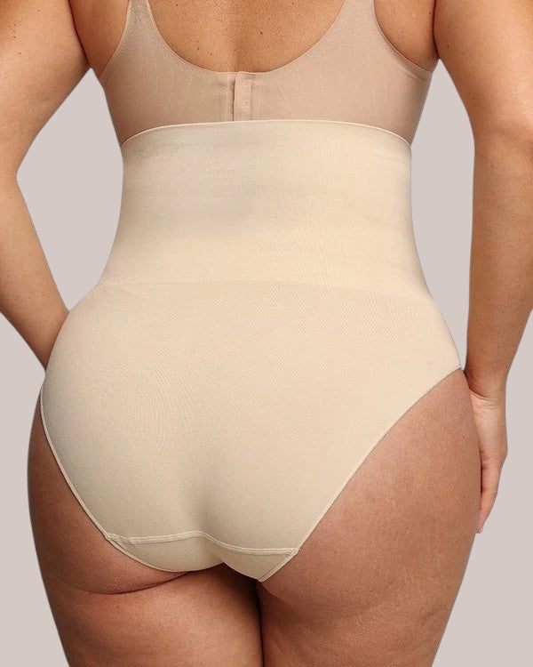 Inshapewear™ high-waisted beige shaping panties providing firm tummy control and a smooth silhouette from behind