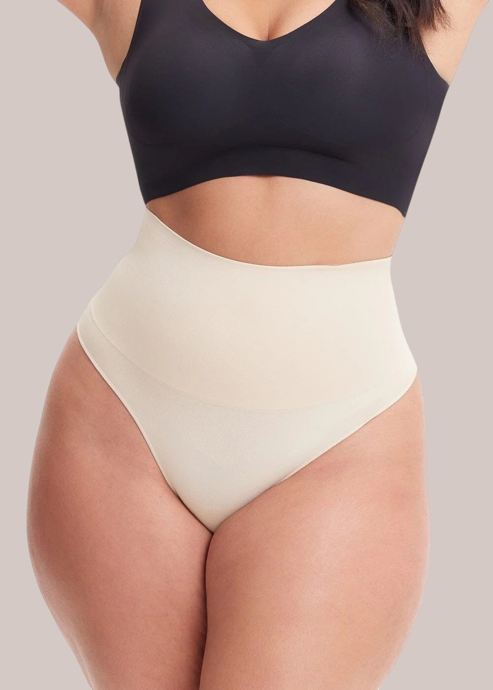 Inshapewear™ high-waisted beige shaping thong providing tummy control and a seamless silhouette