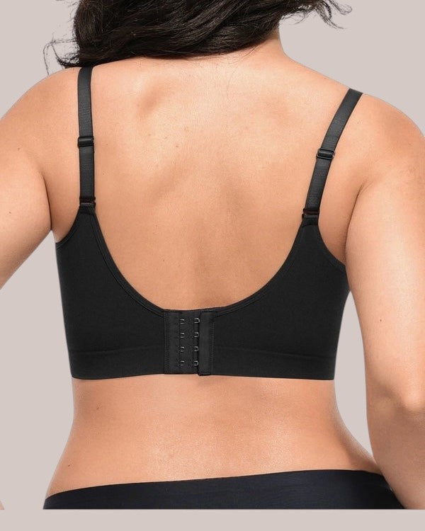 Back view of Inshapewear™ seamless black bra with adjustable straps and hook-and-eye closure on a model